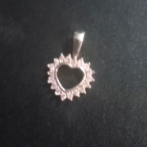 Heart shaped silver necklace stud with pink stones